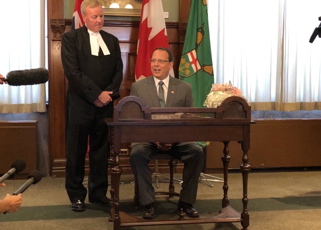 A newly sworn-in Mike Schreiner calls Ford “reckless” on climate change
